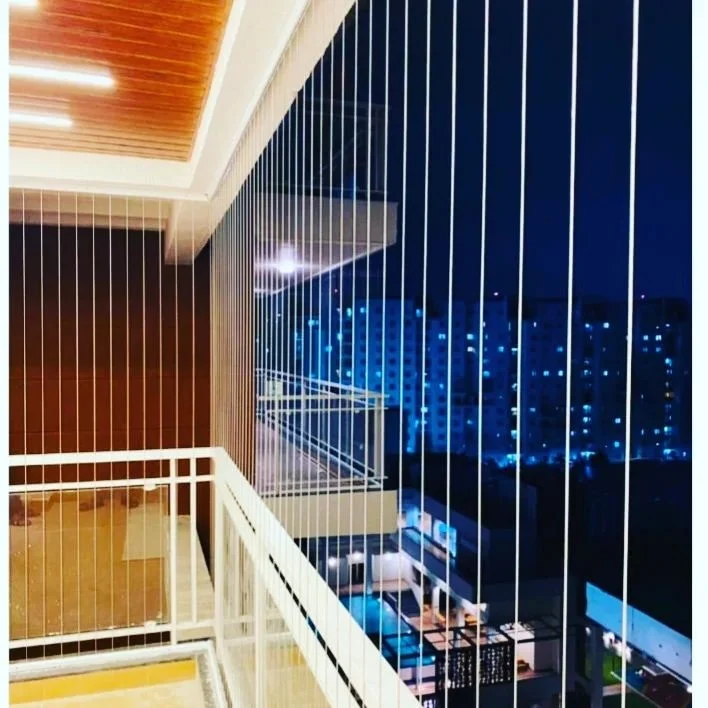 Invisible Grills — Stainless steel cable barriers that protect without blocking the view.